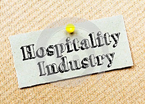 Recycled paper note pinned on cork board. Hospitality Industry Message