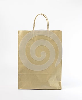 Recycled paper shopping bag on white background.