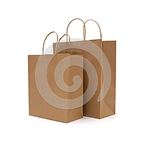 Recycled paper shopping bags on white