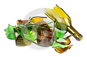 Recycled.Shattered green and brown bottle