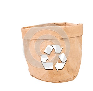 Recycled sign on brown paper flower pot or bag isolated on white background with clipping path