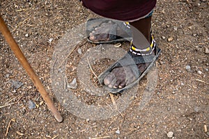 Recycled tires become a Maasai mans sandals in Tanzania, Africa