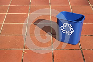 Recycling bin in the middle of a path