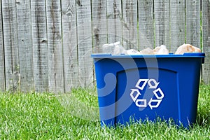 A recycling bin outside