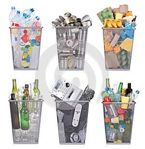 Recycling bins with paper, plastic, glass, metal, and electronic waste