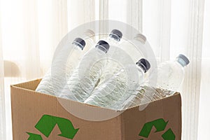 Recycling box filled with clear plastic containers