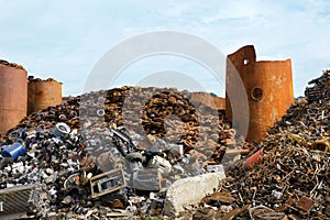 Recycling center piles of tubing, metal and other scrap materials