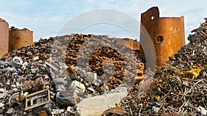 Recycling center piles of tubing, metal and other scrap materials