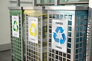 Recycling concept. bins for different garbage. Waste management concept. Waste segregation. Separation of waste on garbage cans photo