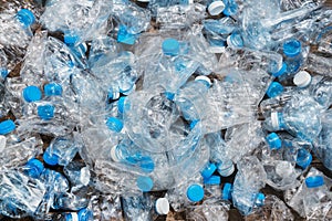 Recycling concept. problem of ecology, environmental pollution. Background of plastic bottles transparent blue net.