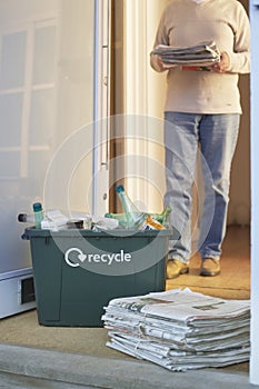 Recycling Container And Pile Of Waste Papers