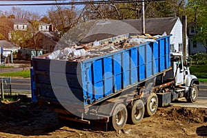 Recycling container trash dumpsters being full with garbage