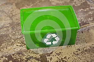 Recycling sign on plastic box