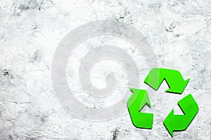 Recycling symbol in eco concept on stone background top view mock-up