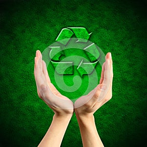 Recycling symbol on hand