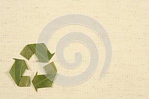 Recycling symbol made from leaves