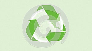 Recycling symbol on the planet Earth