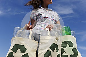 Recycling: woman holding bag