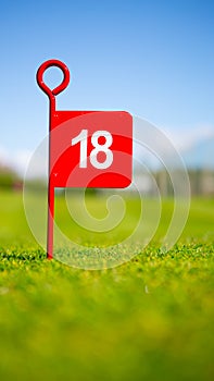 Red 18 hole golf flag