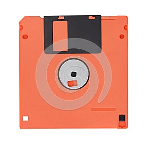 Red 3.5-inch floppy disk or diskette isolated on white