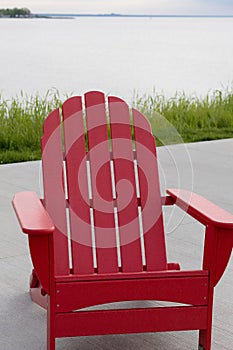 Red Adirondack chair at the Euclid Beach in Cleveland, Ohio