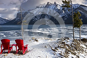 Red Adirondack Chairs at Lake Minnewanka