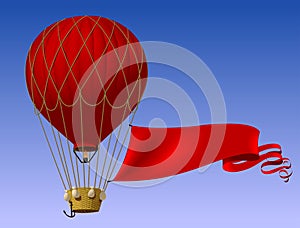 Red air balloon with red banner and wicker basket isolated on blue sky