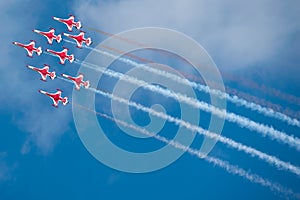 Red airplanes at airshow photo