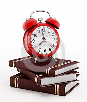 Red alarm clock on books