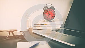 Red Alarm Clock on office table objects