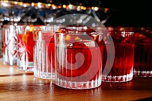 Red alcohol cocktail in glasses