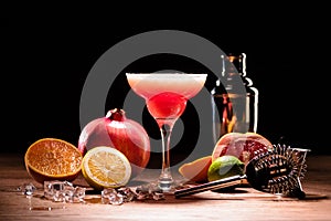 red alcohol margarita drink with fruits