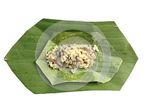Red ant eggs on banana leaf