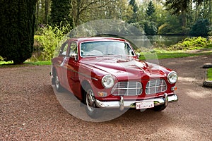 A red antique car