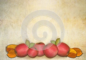 Red apple and autumnleaves on a textured background with copyspace for your text