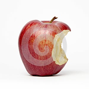 Red apple with a bite out of it, isolated