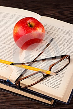 Red apple and book