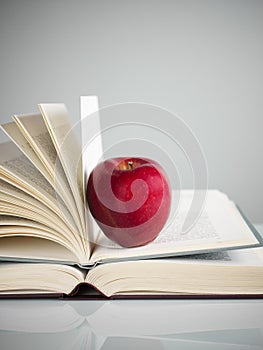 Red apple on books