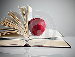 Red apple on books