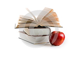Red apple and books (with clipping path)