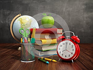 Red apple, books, pencil holder, model globe and alarm clock on green blackboard. 3D illustration