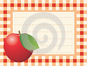 Red apple on chequered background