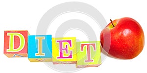 Red apple and cubes with letters - diet