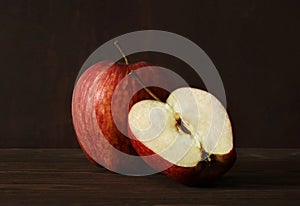 Red apple on dark background