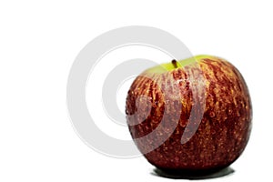 A Red apple with drops isolated on white background