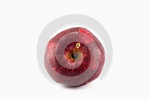 Red apple with drops isolated on white background-top view