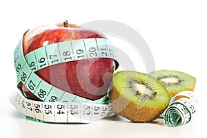 Red apple fitnes concept with centimeter.