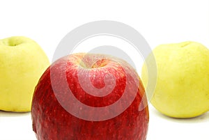 Red Apple in front of Yellow