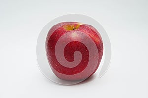 Red apple fruit on white background