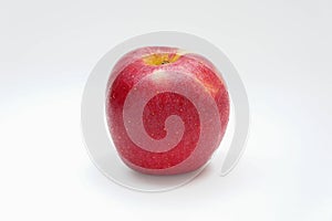 Red apple fruit on white background